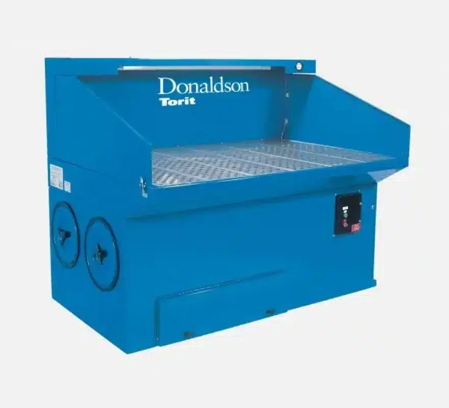 Donaldson Torit downdraft bench with mesh work surface and dust collection compartment underneath